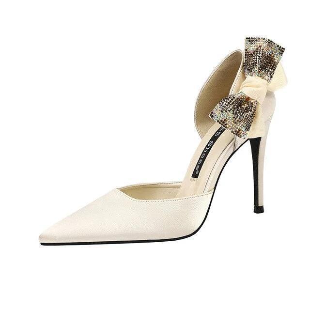 White Pointed Toe Pumps