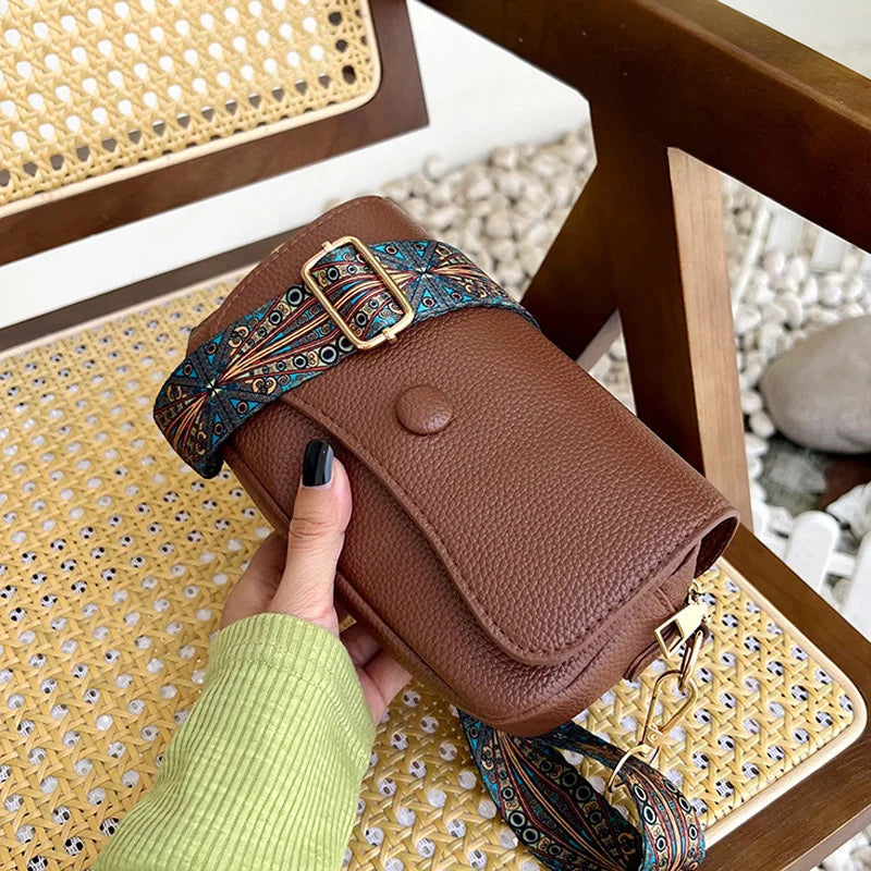 Brown textured crossbody bag