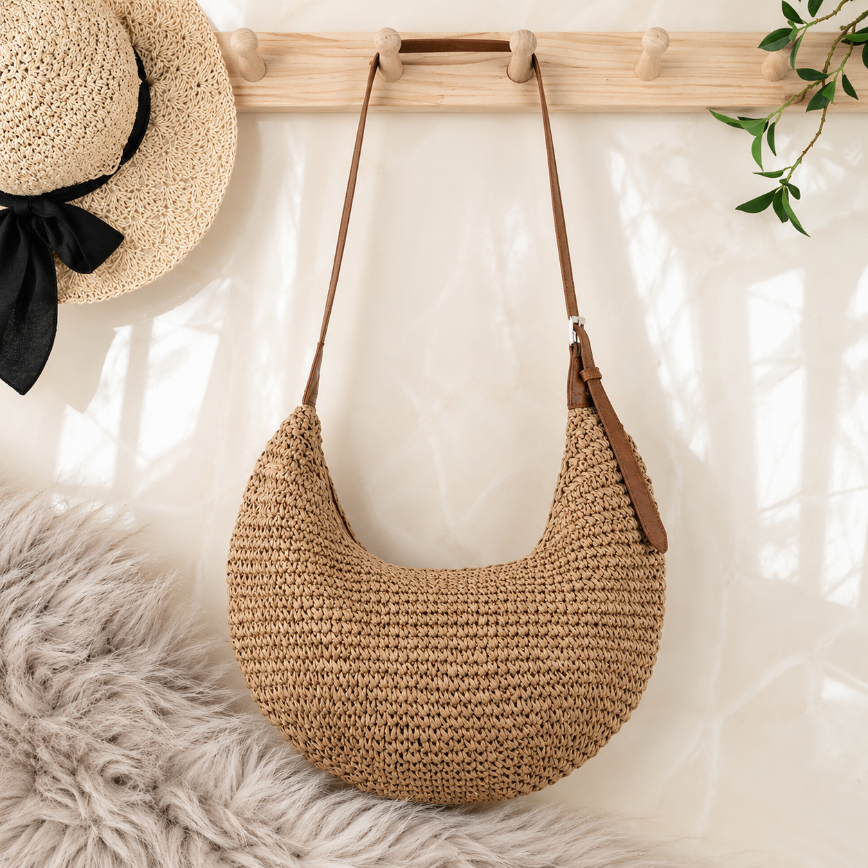 Woven straw crescent bag