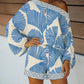 Off-shoulder tropical print romper