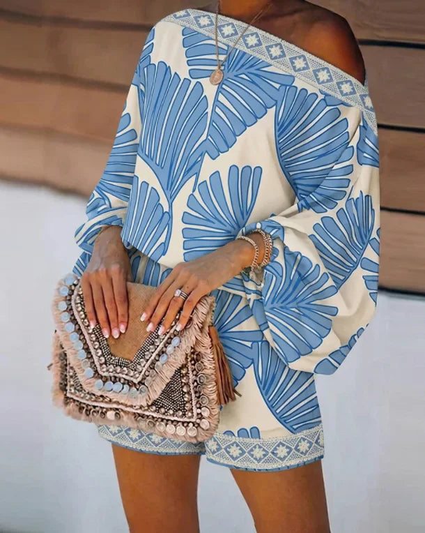 Off-shoulder blue leaf romper