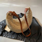Adjustable strap straw bag
