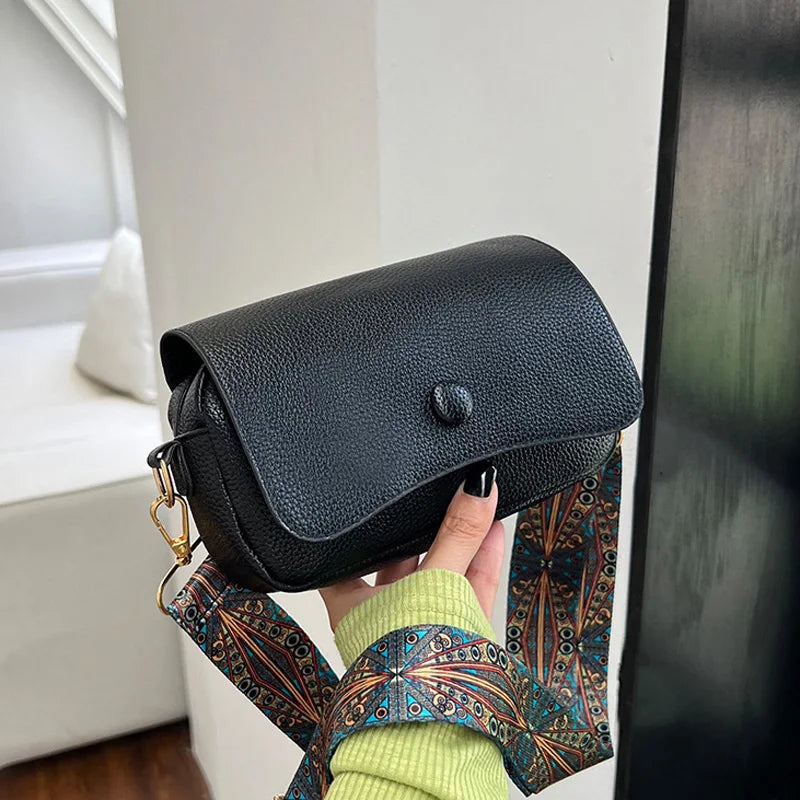 Printed strap shoulder bag
