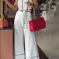 White jumpsuit with pockets