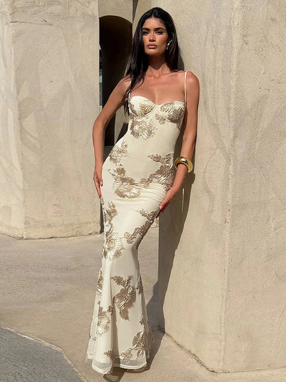 Spaghetti strap evening dress with appliqué details