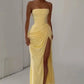 Yellow ruched evening dress