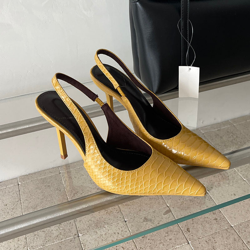 Glossy pointed toe slingback pumps