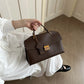 Brown pebbled texture handbag