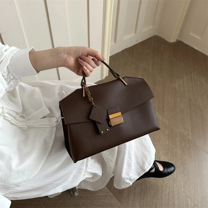 Brown pebbled texture handbag