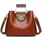 Adjustable strap women handbag