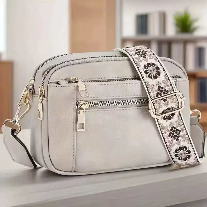 White crossbody organizer bag