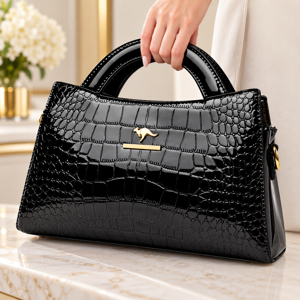 Black crocodile embossed handbag