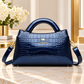 Navy blue crocodile embossed handbag
