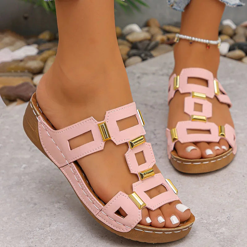 Pink cutout flat sandals