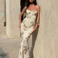Appliqué detailed evening dress