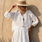 Embroidered eyelet cotton blouse