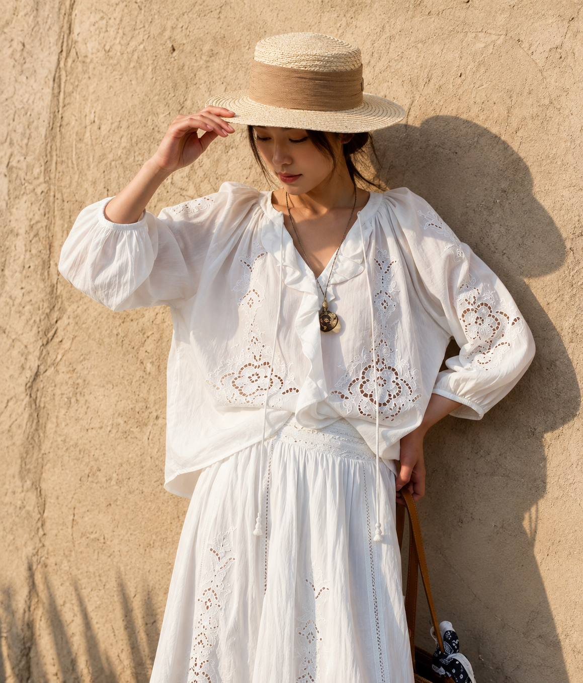 Embroidered eyelet cotton blouse