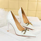 White Leather shoes: Studs Pumps