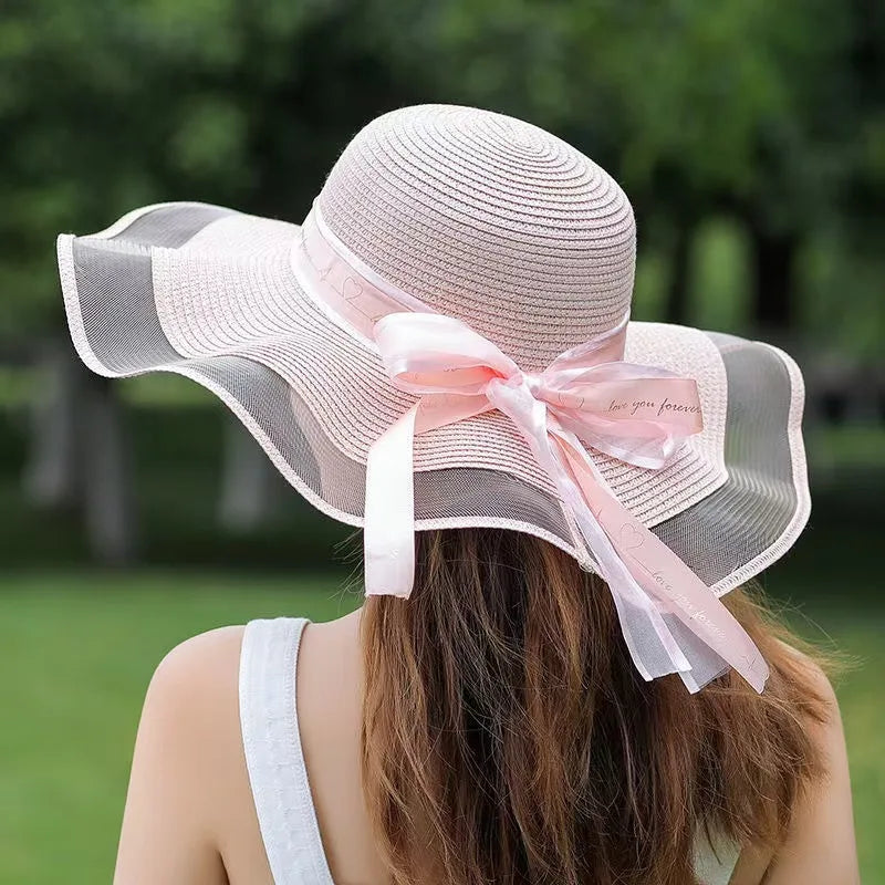 Ribbon bow wide brim hat