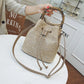Woven straw bucket bag