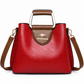 Metal handle shoulder handbag