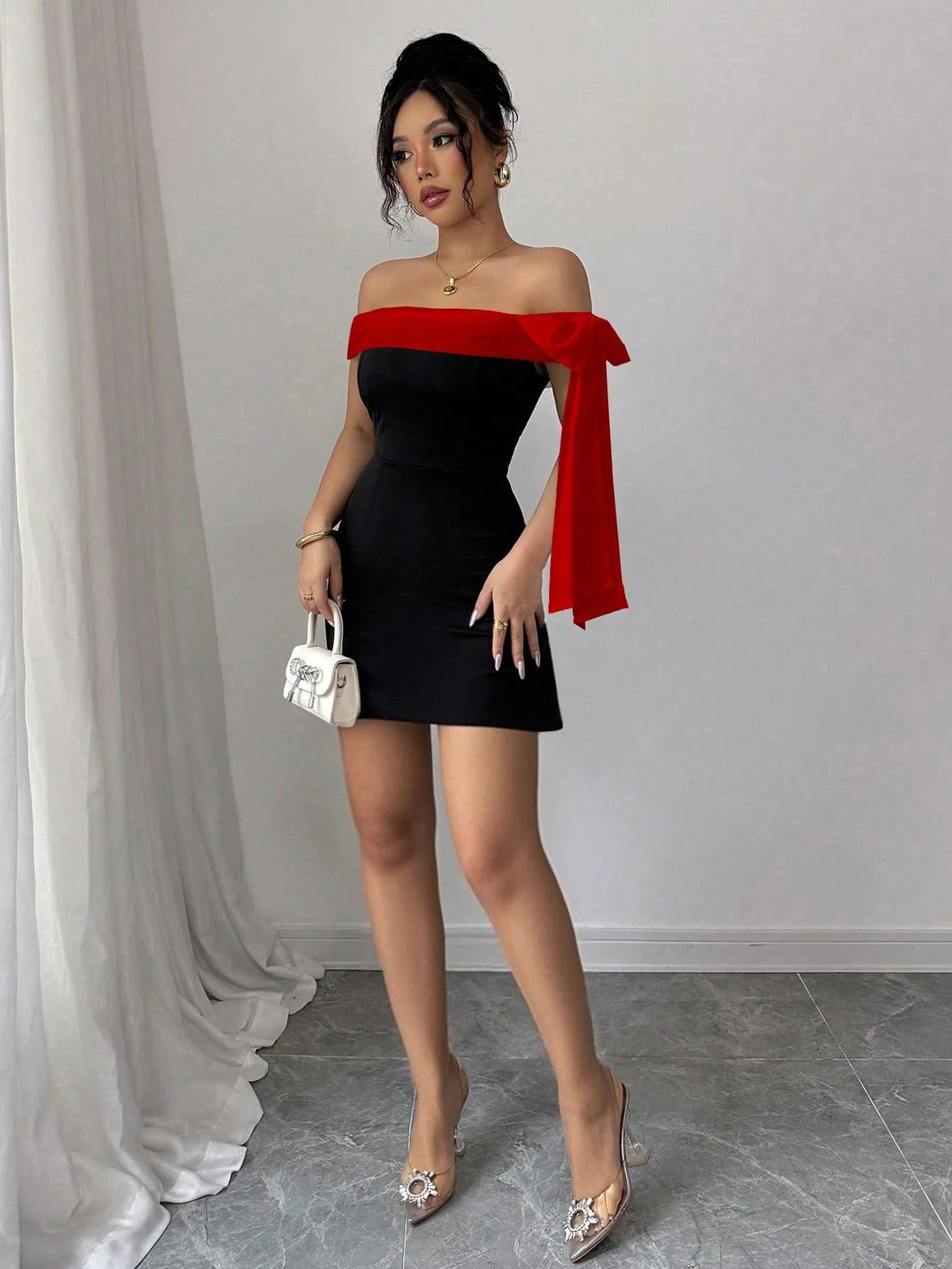 Black off shoulder mini dress
