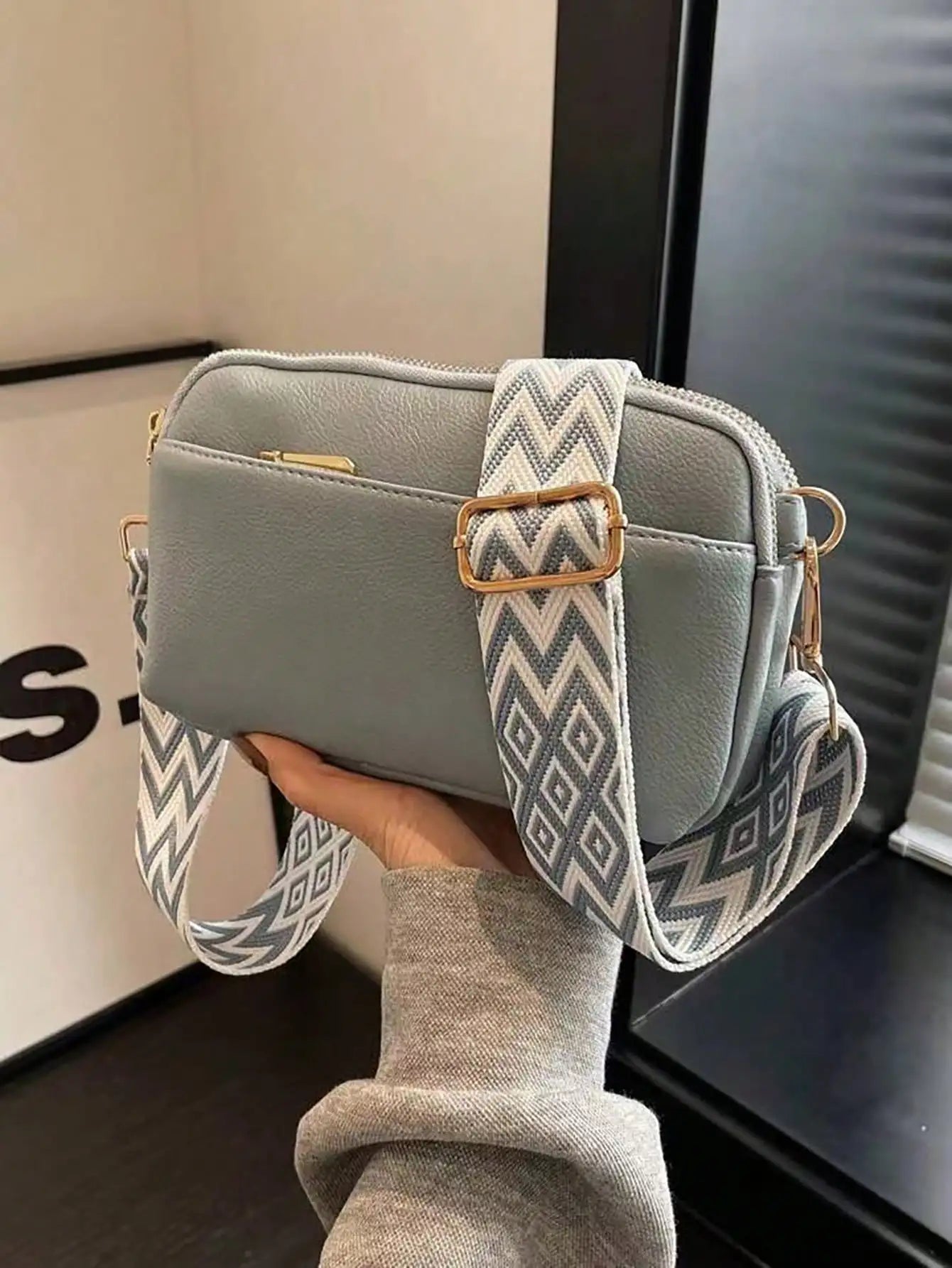 Geometric strap crossbody bag