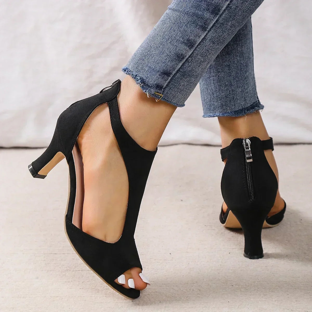 Black cutout heel sandals