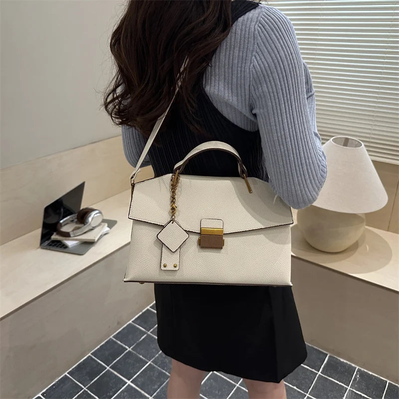 Ivory structured shoulder handbag