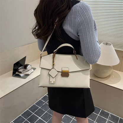 Ivory structured shoulder handbag