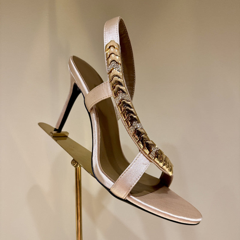 Gold link detail heels