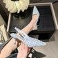 Blue pointed toe pumps