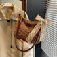Woven straw shoulder bag