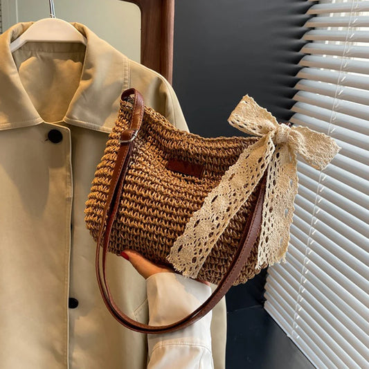 Woven straw shoulder bag