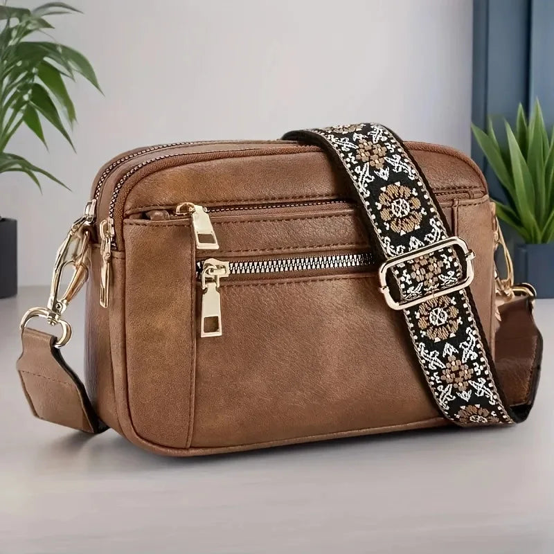 Adjustable floral strap bag